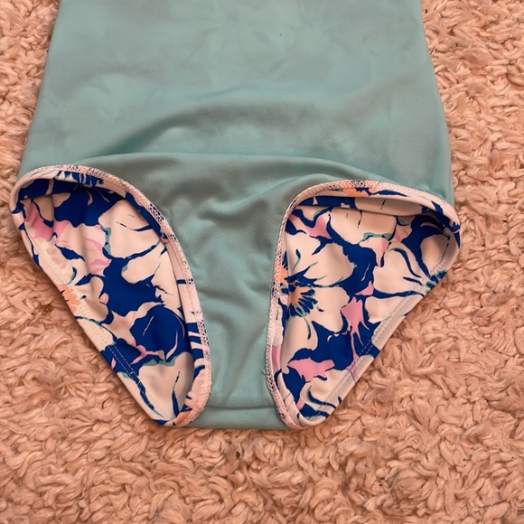 Girls swimsuit. In good condition. Has a yellow stain as seen on last pic. - Picture 3 of 4